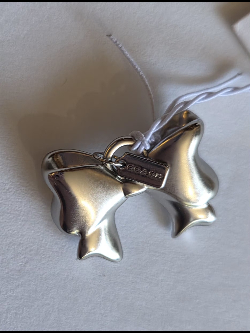 Coach Silver Bow Charm Pendant - Picture 3 of 3